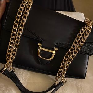 Gold chain leather handbag